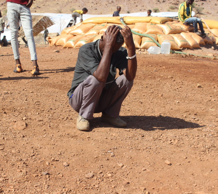 An Ethiopian refugee in despair, Um-Rakoba Refugee Camp, Gedarif, Sudan. Many refugees left all their belongings behind, some were separated from their families.&nbsp;The Um-Rakuba Refugee Camp in Gedarif Sate of Sudan is currently home to over 20,000 refugees who have fled&nbsp;conflict in Ethiopia.&nbsp;Islamic Relief has responded to the refugee crisis since November 2020 and has provided food items among other essential items. Islamic Relief has also provided non-food items such as kitchen utensils and also hygeine kits for women and girls. We have also built latrines and washing facilities at the camp.&nbsp;Islamic Relief continues to work at Um-Rakuba Refugee Camp providing the most essential assistance to the refugees.&nbsp;These photos show the general environment and activities undertaken by refugees at the Um-Rakuba Refugee Camp.